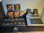 magnavox-odyssey-2-gray-console-with-5-entire-boxed-games-and-13-loose-games.jpg